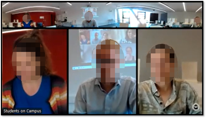 Die Abbildung zeigt den View der Online-Teilnehmenden über die Meeting Owl in den Präsenzraum. Der Dozent sowie zwei Studierende sind per Split-Screen groß in der Zoom-Kachel zu sehen.